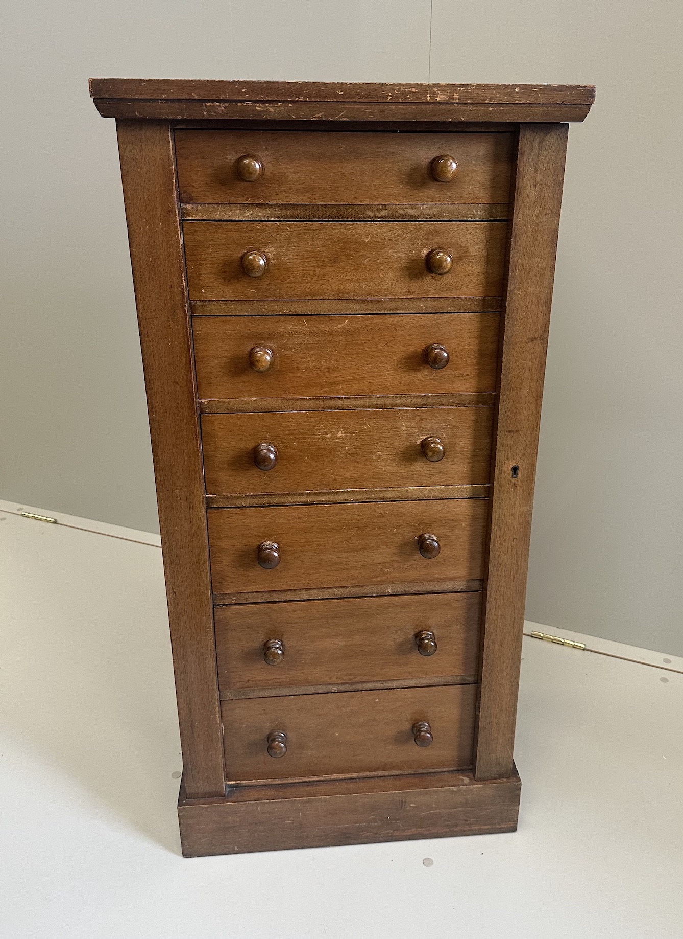 A late Victorian mahogany Wellington chest, width 51cm, depth 34cm, height 104cm